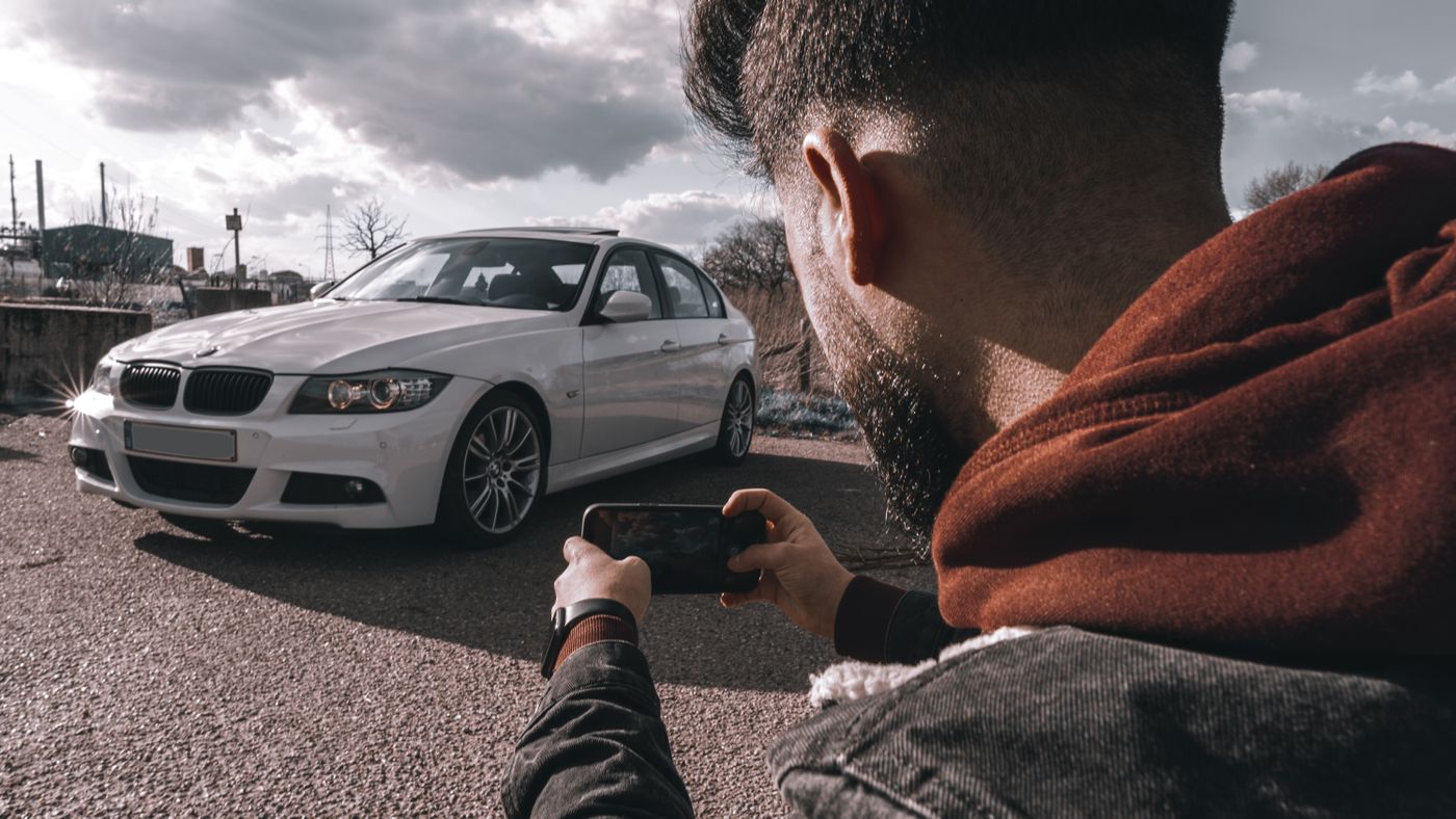 Photographing a car with a smartphone to add to a listing